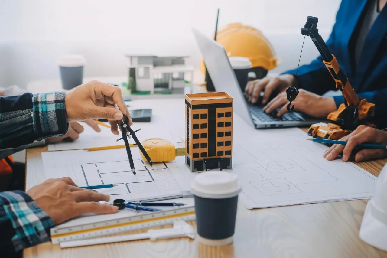 Architects and Engineers Designing Building Project