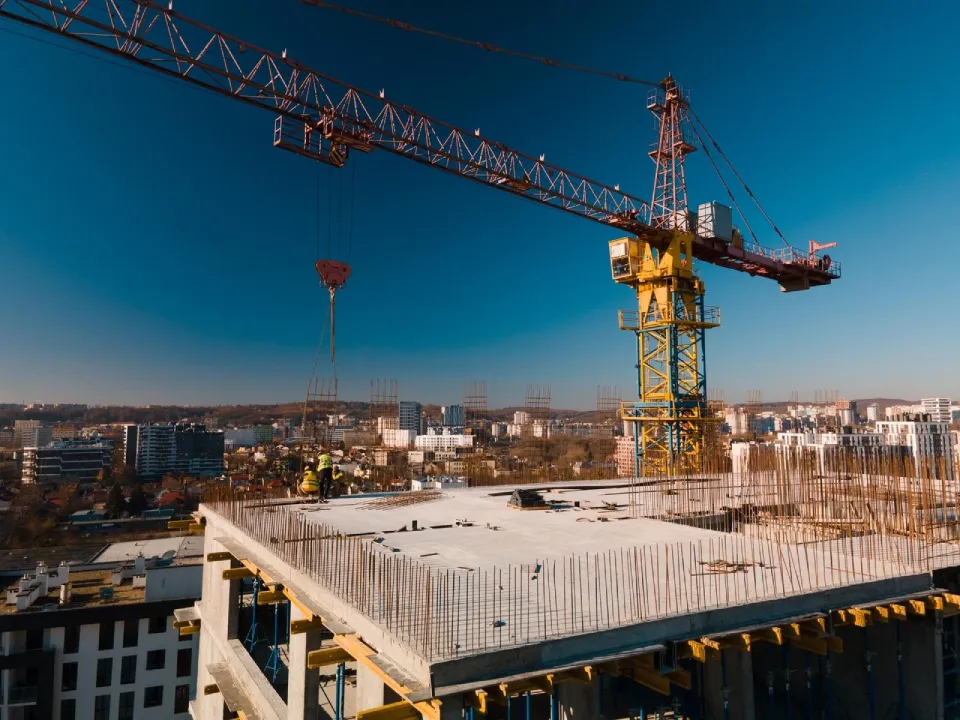 Tower Crane at High-Rise Building Construction Site